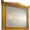 mirror with gilded gold frame and an empire classical shape.