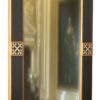 mirror with gilded gold frame and an ornate stud shape.