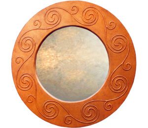 Large round decorative mirror with Celtic braiding in copper