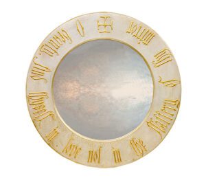 round gothic mirror with beauty script, with black frame.