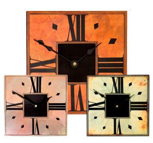 group of small wooden case clocks with different gilded frames and square shapes