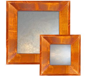 light copper raked overmantle, showing rectangular mirror with copper frame and light finish.