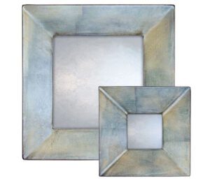 metallic blue swept mirror showing round mirror with blue frame and metallic finish
